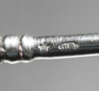 A Set of Six Russian Niello Silver Teaspoons, Maker's marks obscured, Moscow, late 19th/early 20th century, each having a knopped stem,