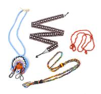 Four Beaded Jewelry Items Diameter of medallion 3 1/4 inches