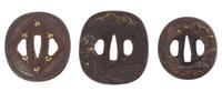 Three Gilt Decorated Iron Tsubas Height of largest 3 1/4 inches.