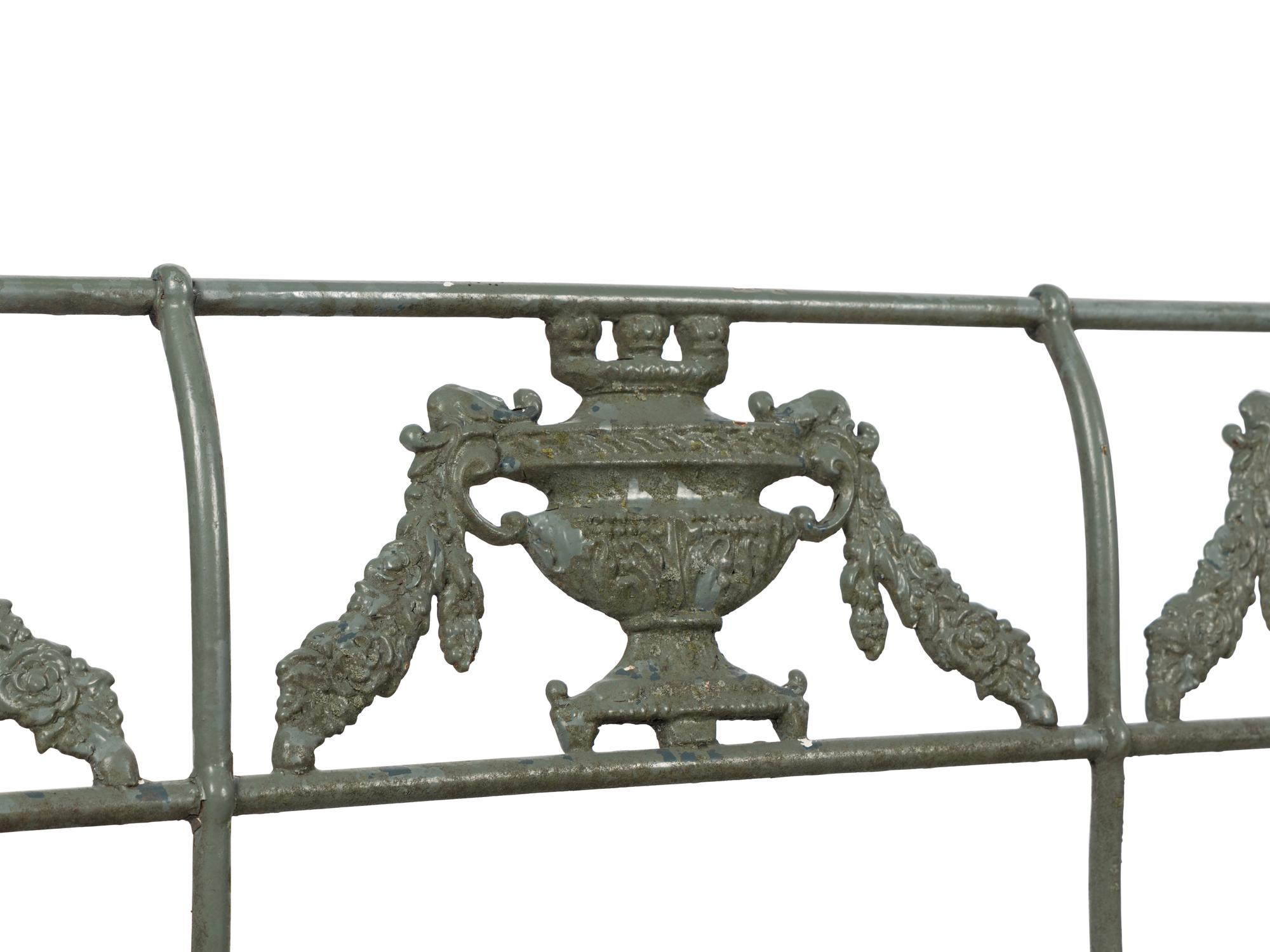 A Pair of Neoclassical Style Painted Iron Garden Benches