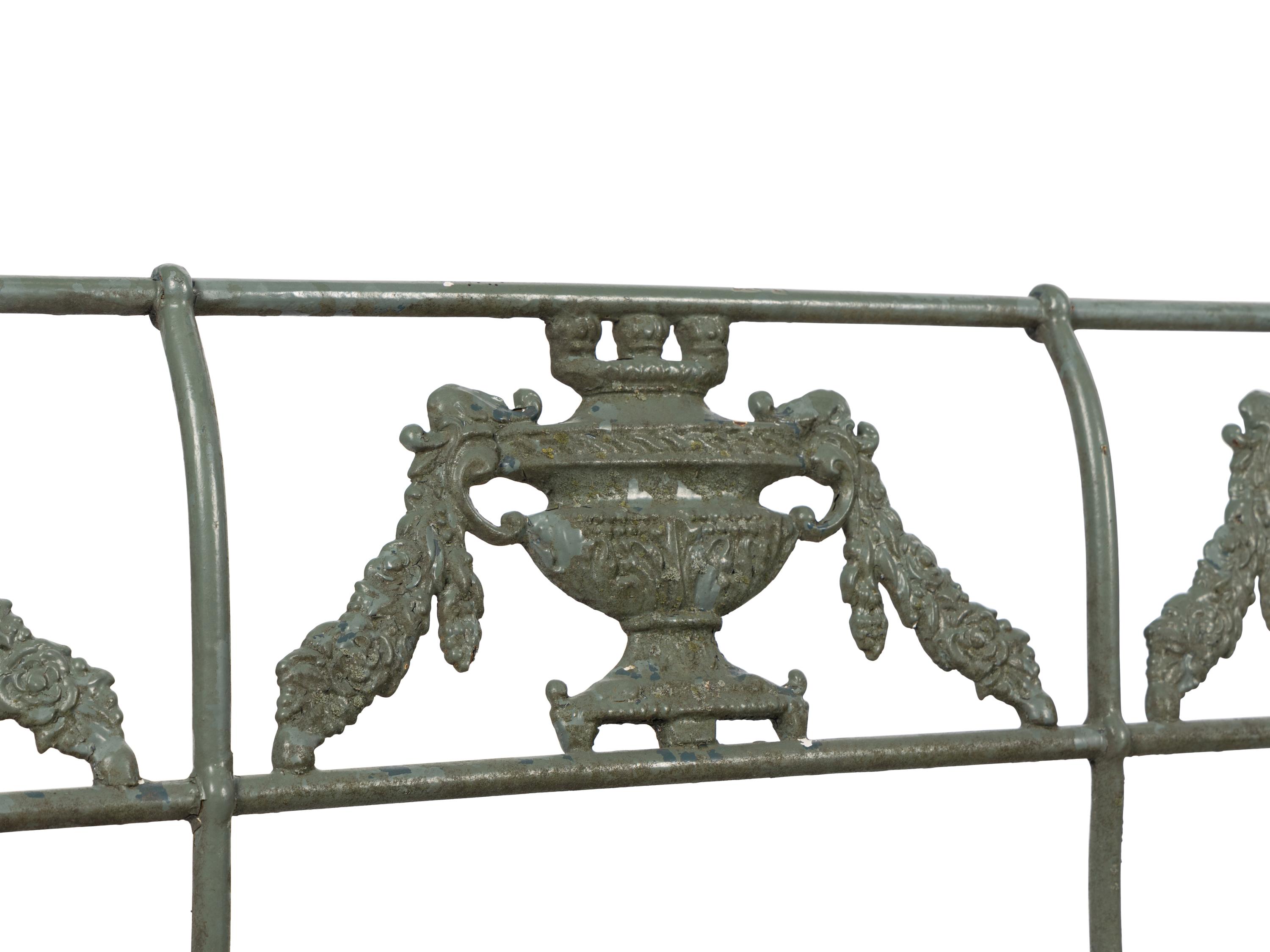 A Pair of Neoclassical Style Painted Iron Garden Benches