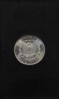 A Group of Four United States 1884-CC GSA Uncirculated Morgan Silver Dollars