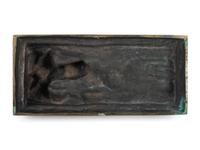 A Cast Bronze Figure of a Reclining Nude Woman