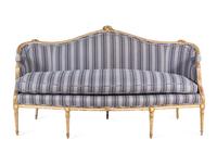 A George III White-Painted and Parcel Gilt Settee