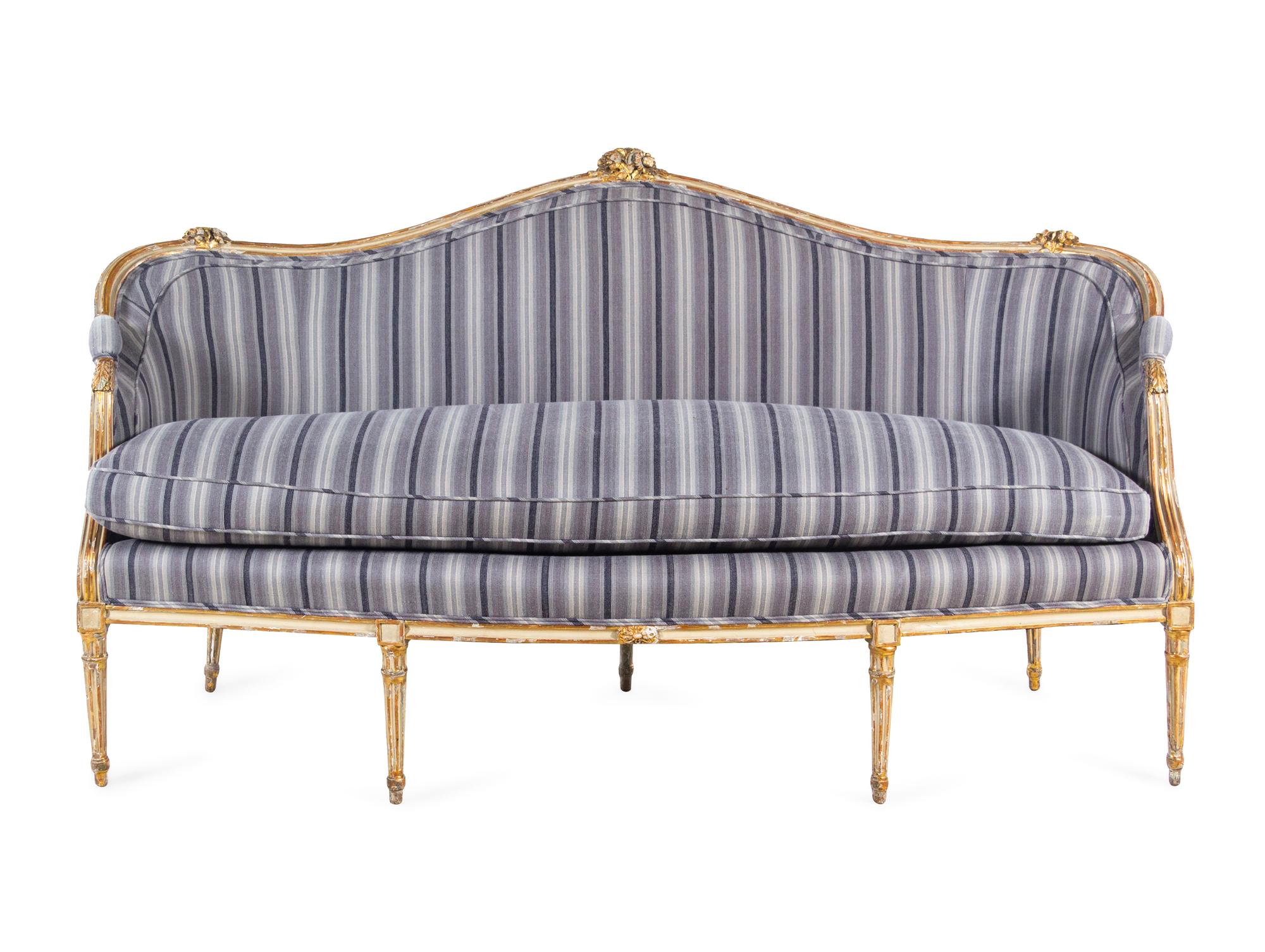 A George III White-Painted and Parcel Gilt Settee