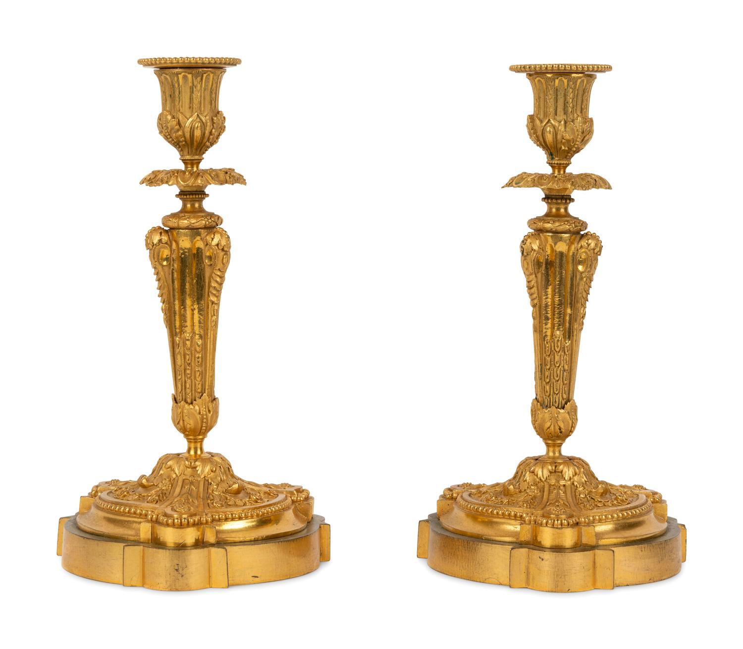 A Pair of Continental Gilt Bronze Candlesticks
