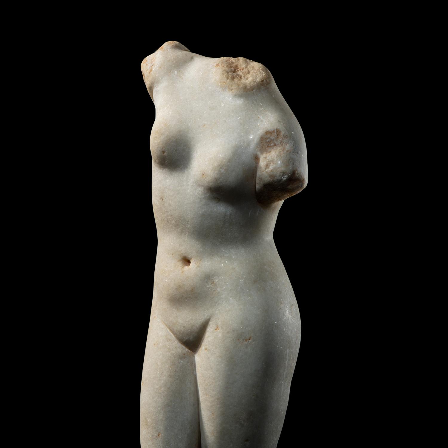 A Greek Marble Torso of Aphrodite Anadyomene