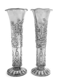 A Pair of American Silver Vases, S. Kirk & Son, Baltimore, MD, each of the bodies decorated with an elaborate garden scene, one depicti