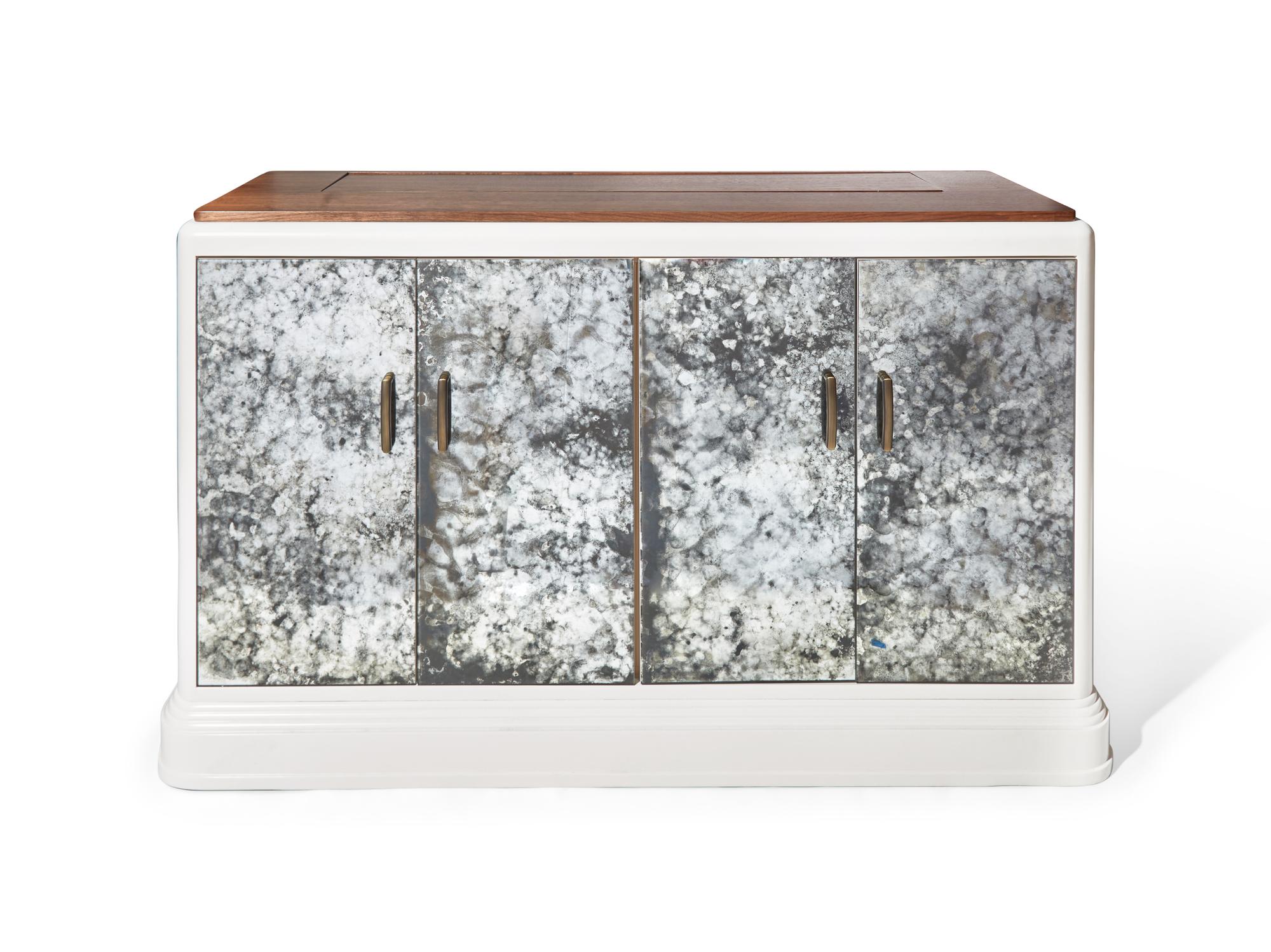 An Antiqued Mirror Mechanized Television Console DONATED BY S.R. GAMBREL, INC.