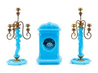 A Continental Blue Opaline Glass Three-Piece Clock Garniture