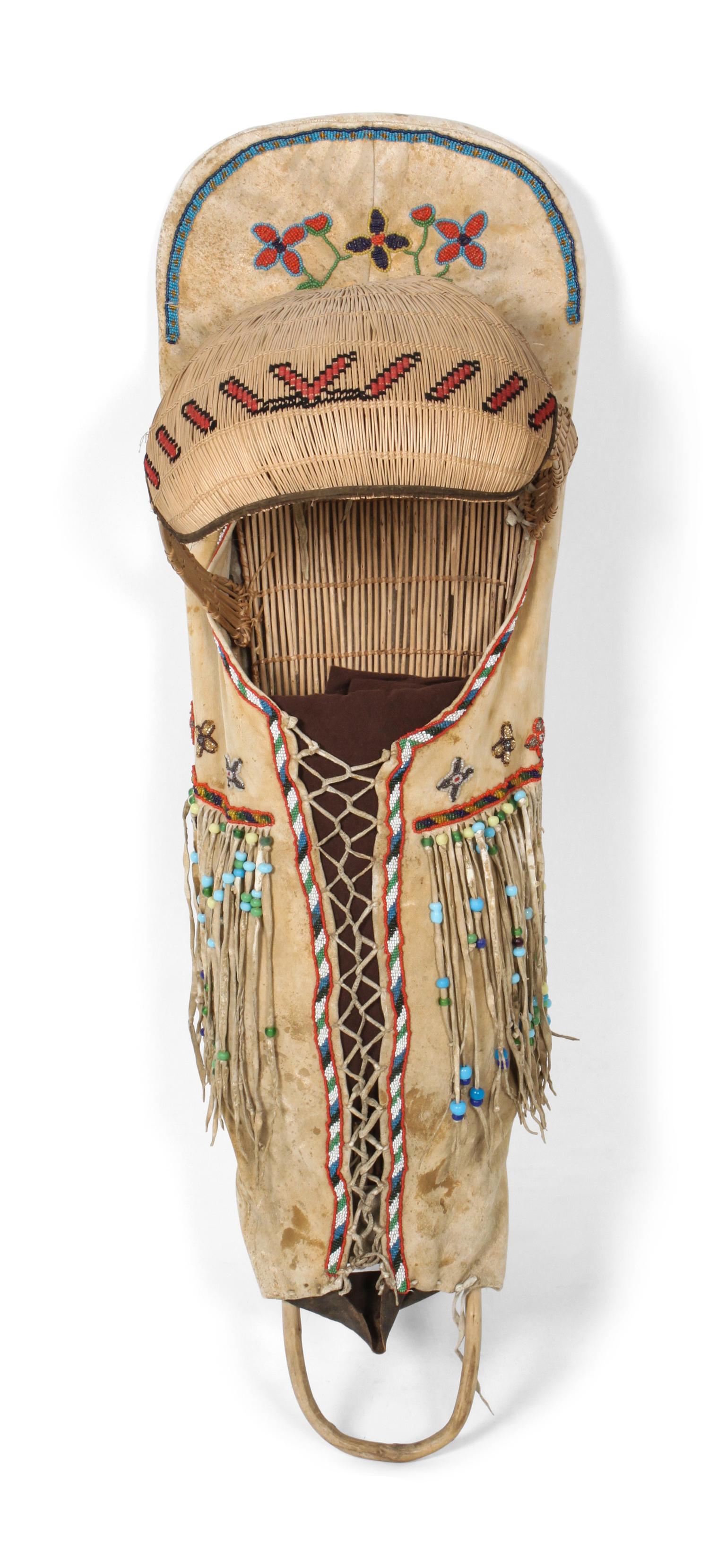 A Paiute Hide and Beaded Cradle Board Length 39 x width 12 inches. — LATE 19TH/ EARLY 20TH CENTURY