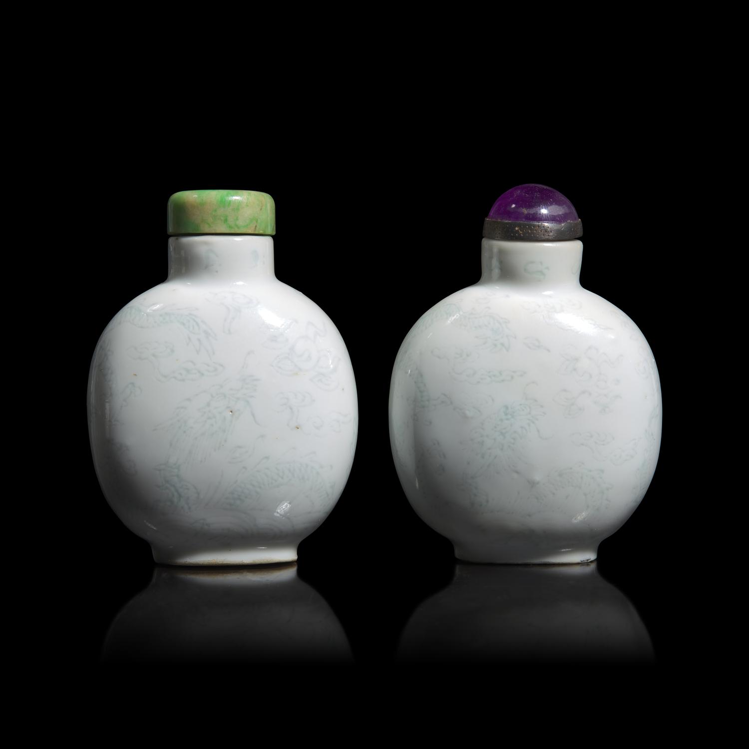 An Unusual Associated Pair of Incised Porcelain "Dragon" Snuff Bottles, Circa 1800-1850