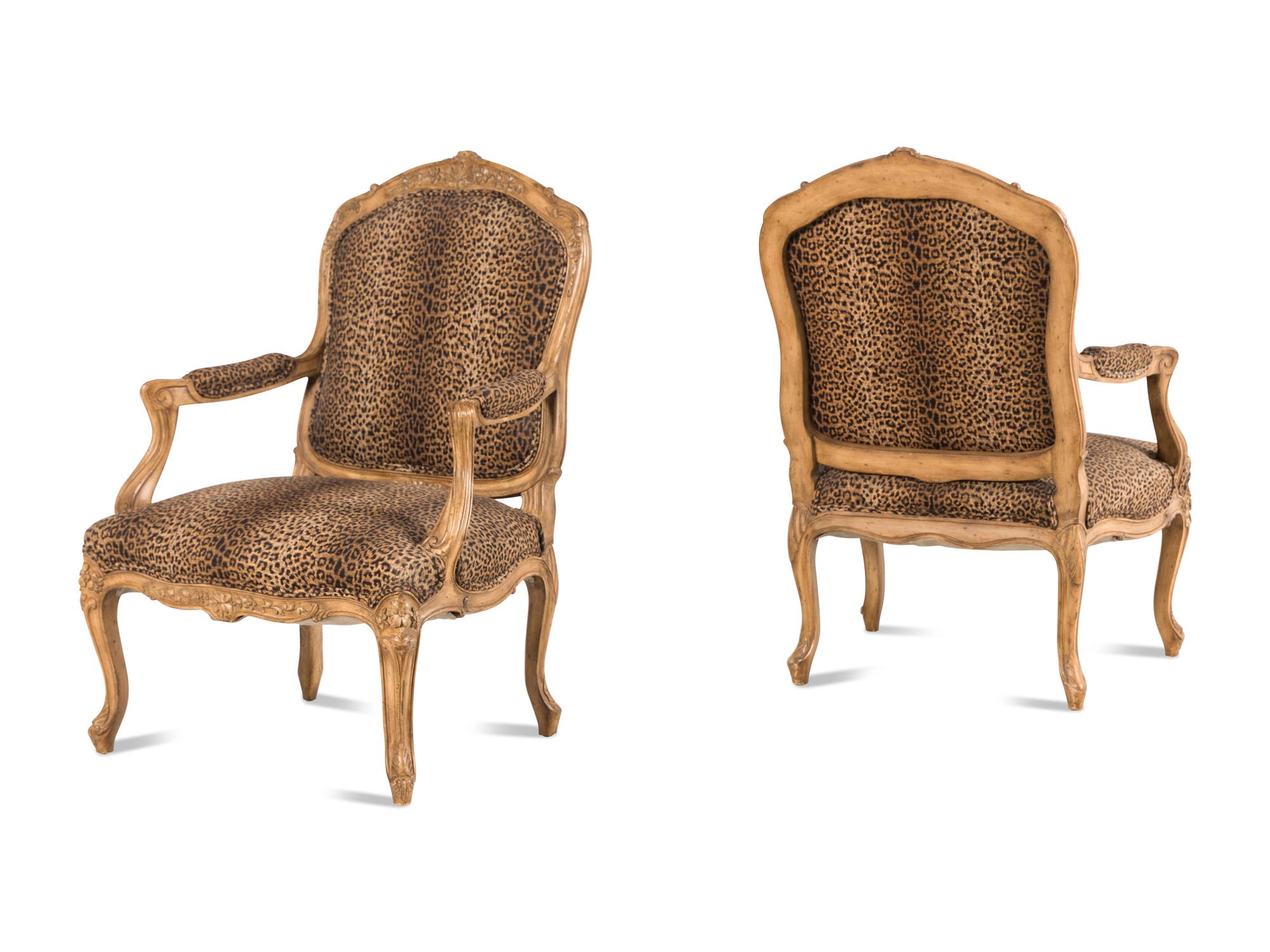 A Pair of Louis XV Style Carved Wood Fauteuils