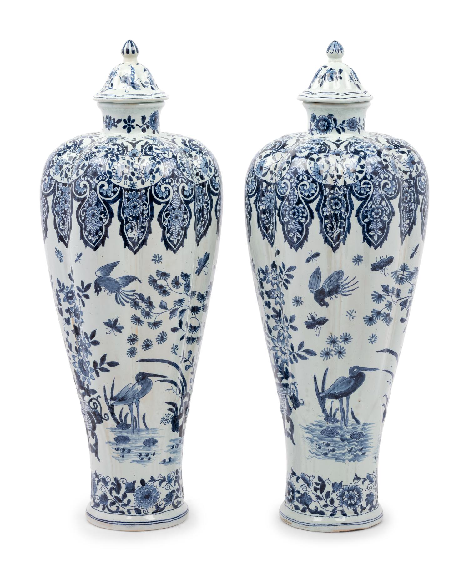 A Pair of Delft Covered Vases