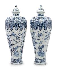 A Pair of Delft Covered Vases