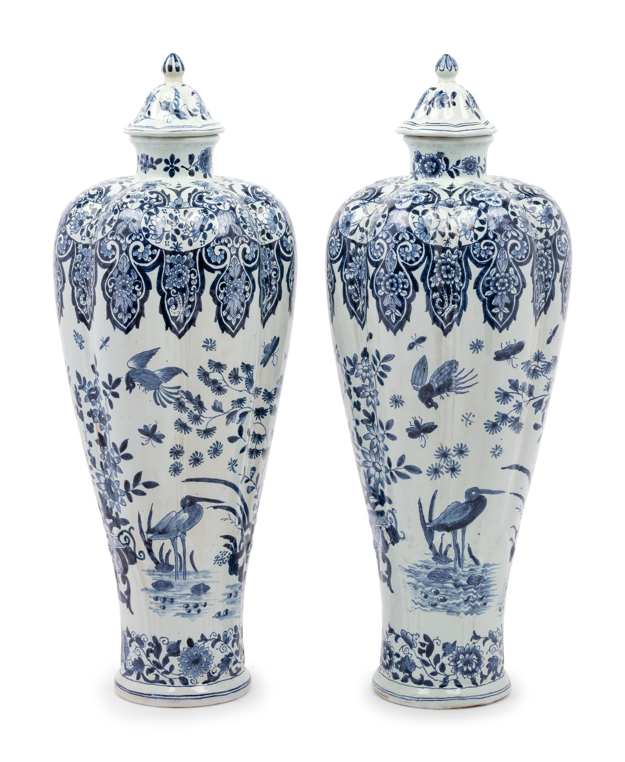 A Pair of Delft Covered Vases
