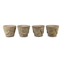 A Set of Four Cast Stone Jardinières