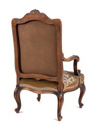 A Pair Louis XV Style Carved Walnut Fauteuils