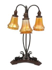 A Cast Metal Three-Light Lamp with Quezal Aurene Glass Shades