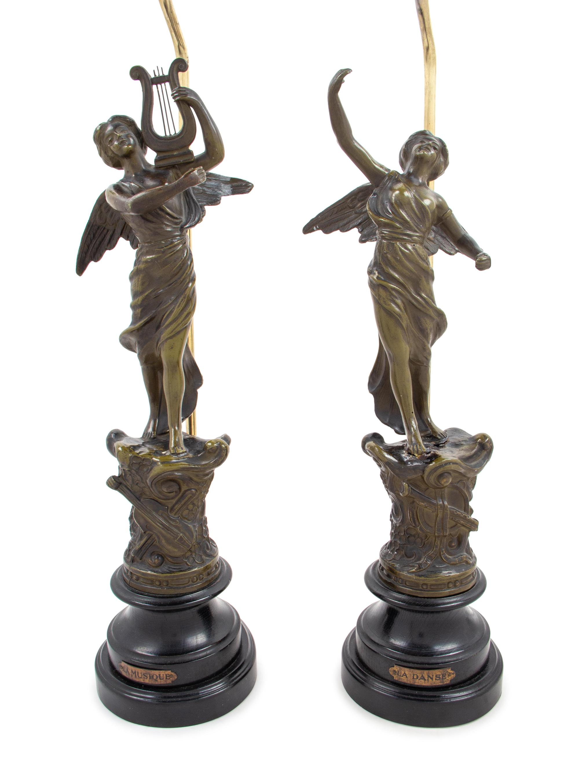 A Pair of Cast Metal Figures Mounted as Lamps
