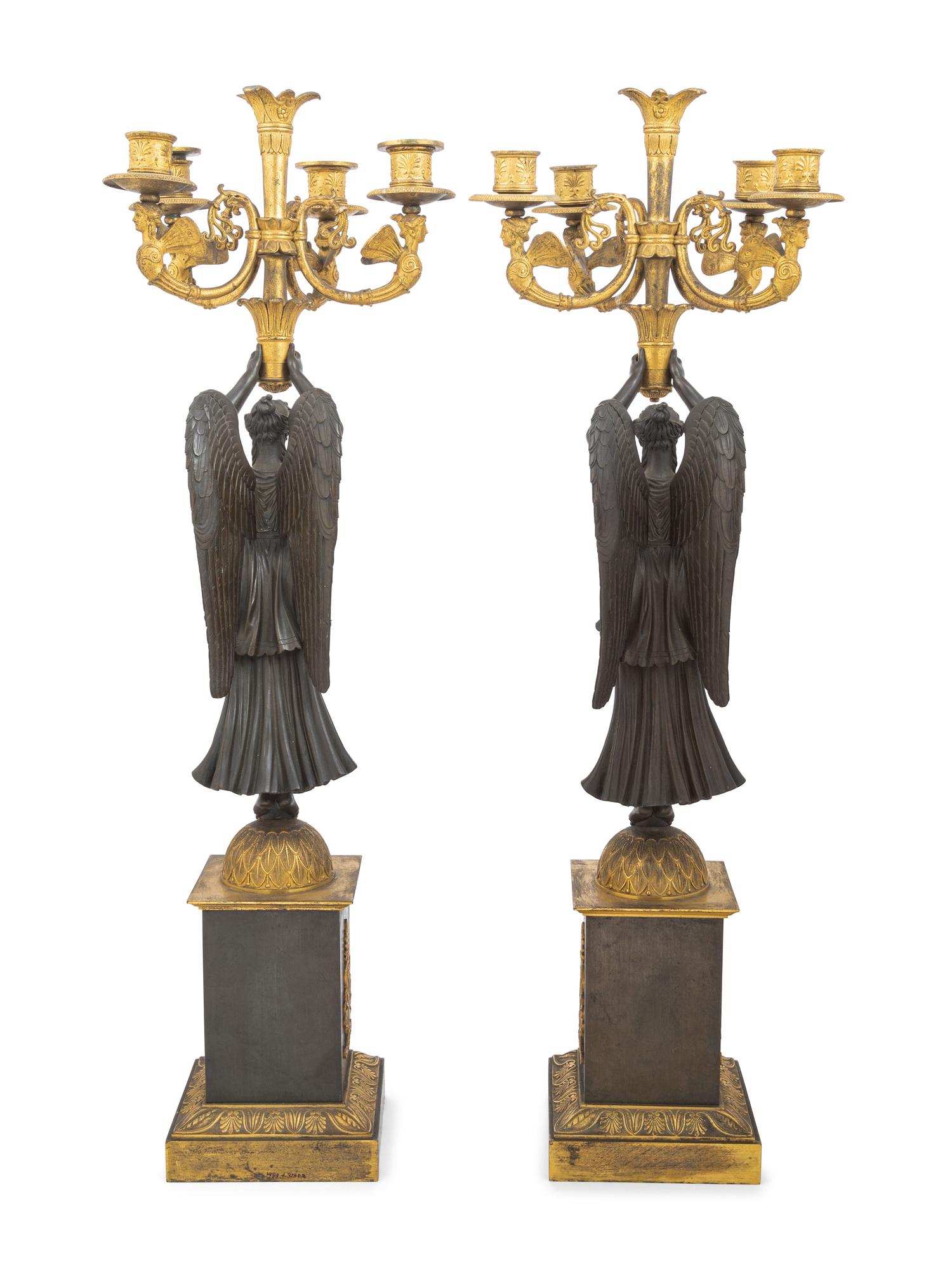 A Pair of Empire Ormolu and Patinated Bronze Figural Five-Light Candelabra