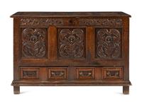 A Jacobean Carved Oak Two-Drawer Mule Chest