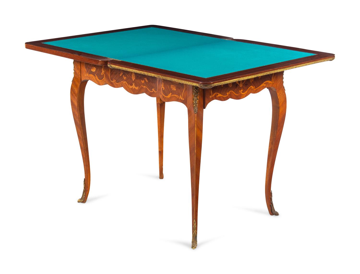 A Louis XV Style Gilt Metal Mounted Marquetry Flip-Top Table
