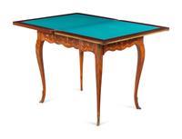 A Louis XV Style Gilt Metal Mounted Marquetry Flip-Top Table