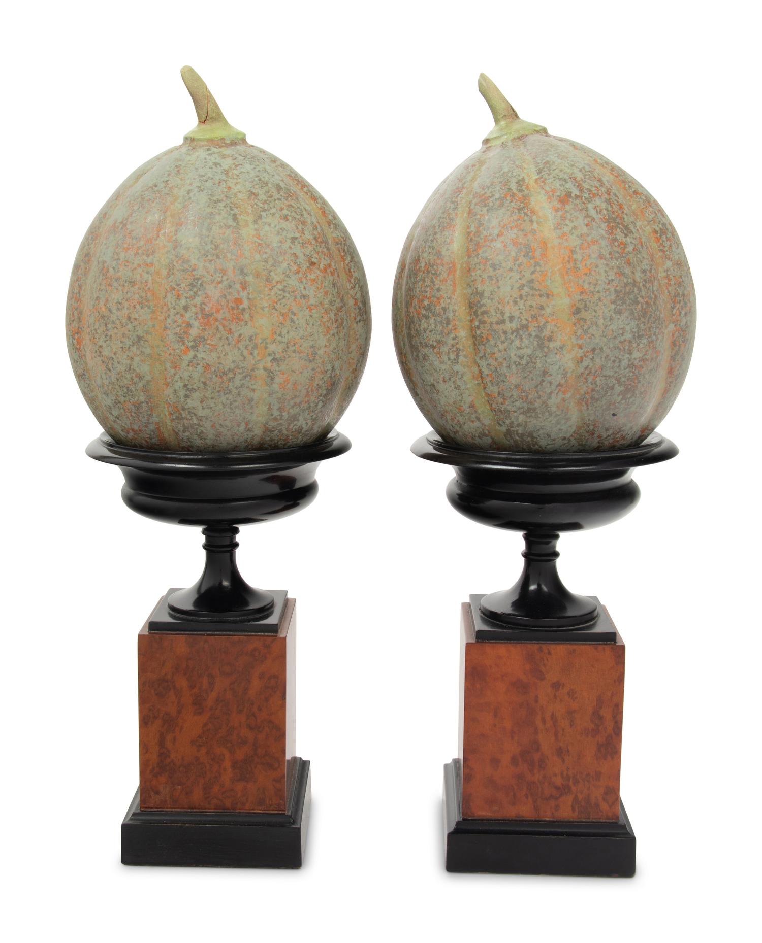 A Pair of Continental Maple Veneered and Parcel Ebonized Urns