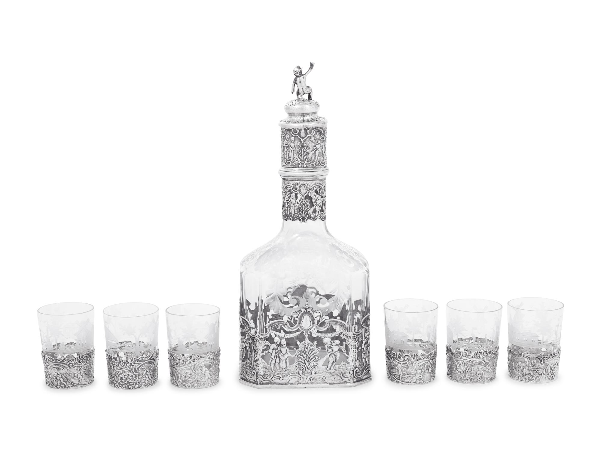 A Continental Silver Mounted Etched Glass Drink Service