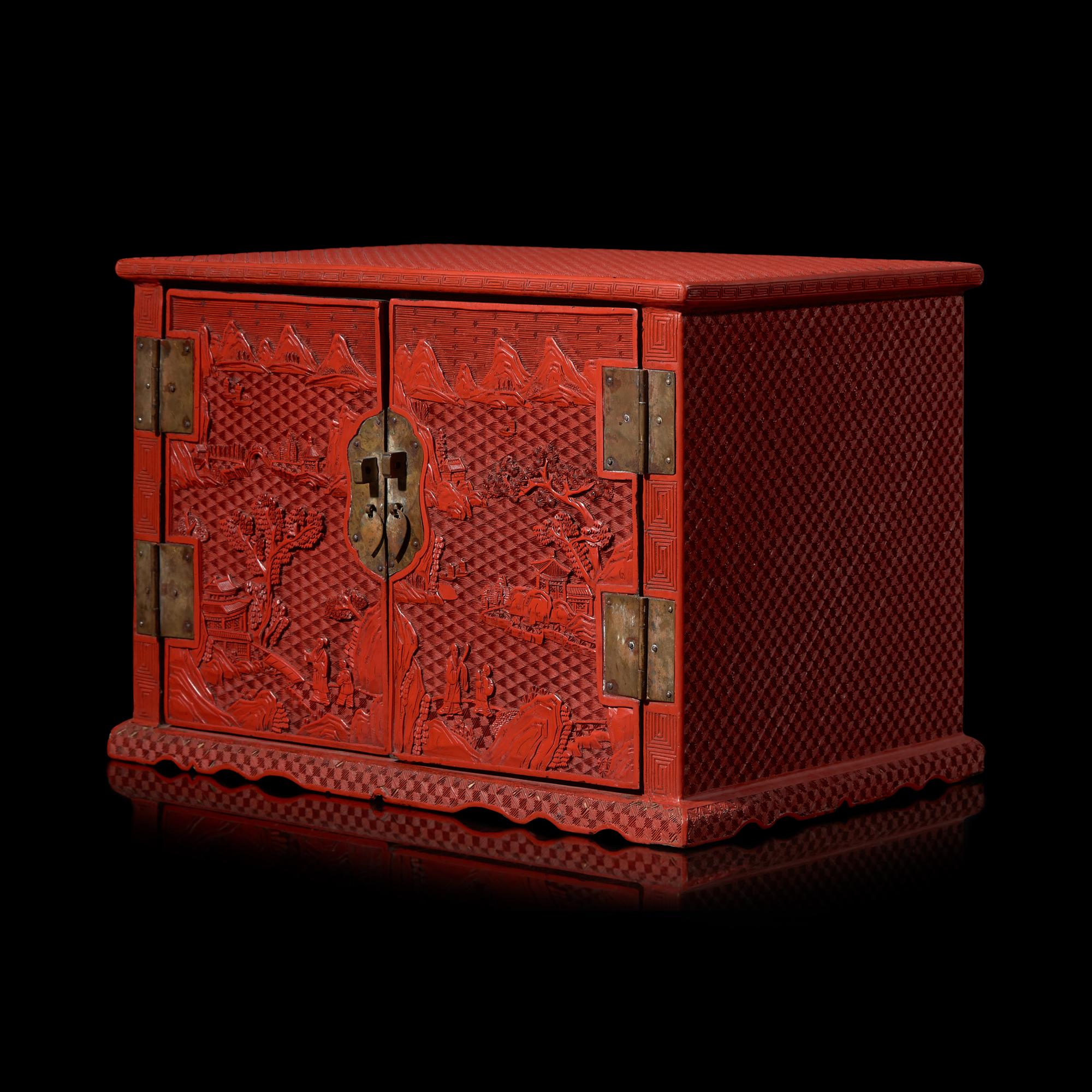 A Chinese Carved Cinnabar Lacquer Two-Door Small Cabinet, Late 19th/20th Century 清末民國 剔紅百寶箱