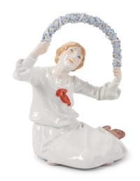 A Meissen Porcelain Figure of a Girl with Floral Wreath