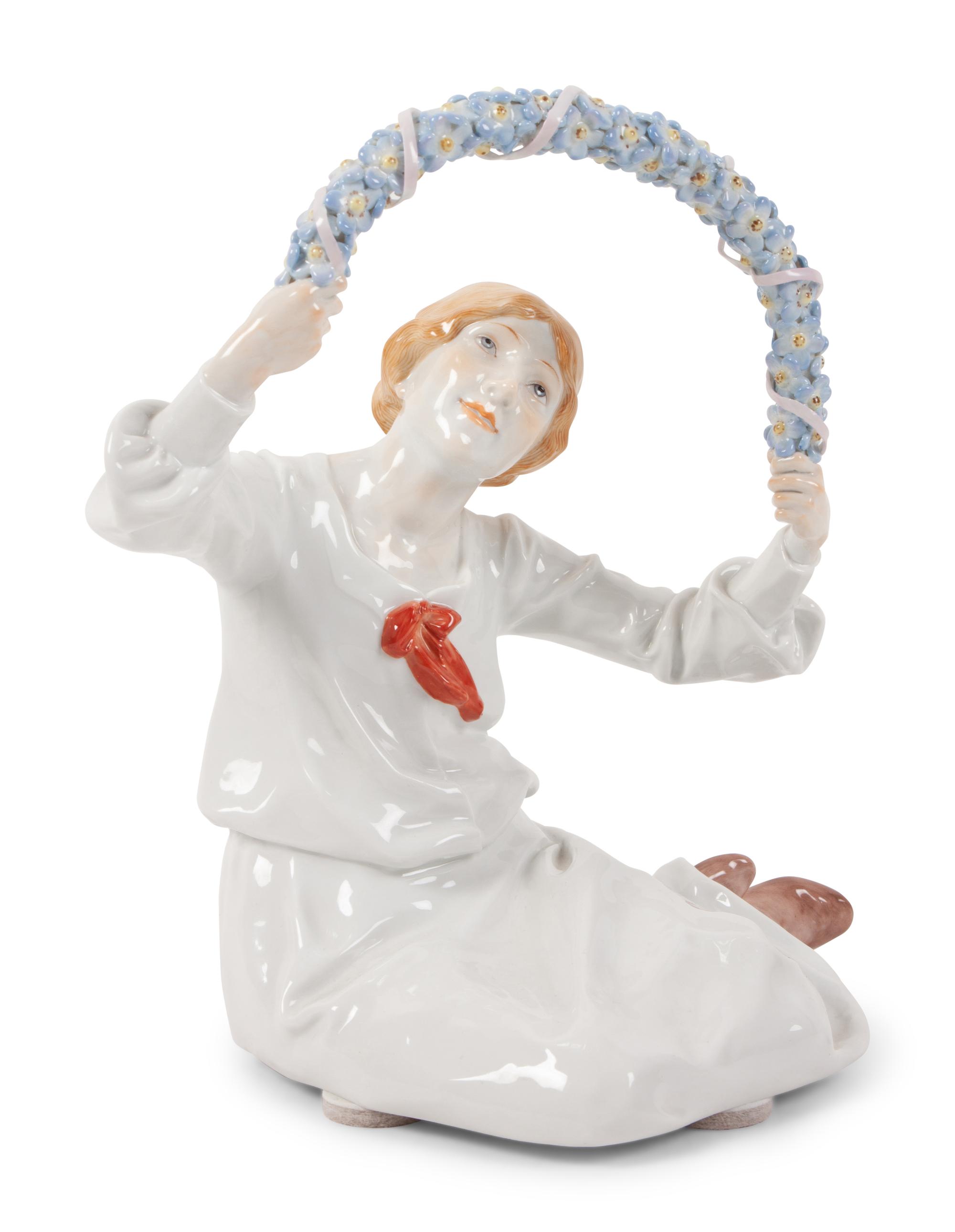 A Meissen Porcelain Figure of a Girl with Floral Wreath