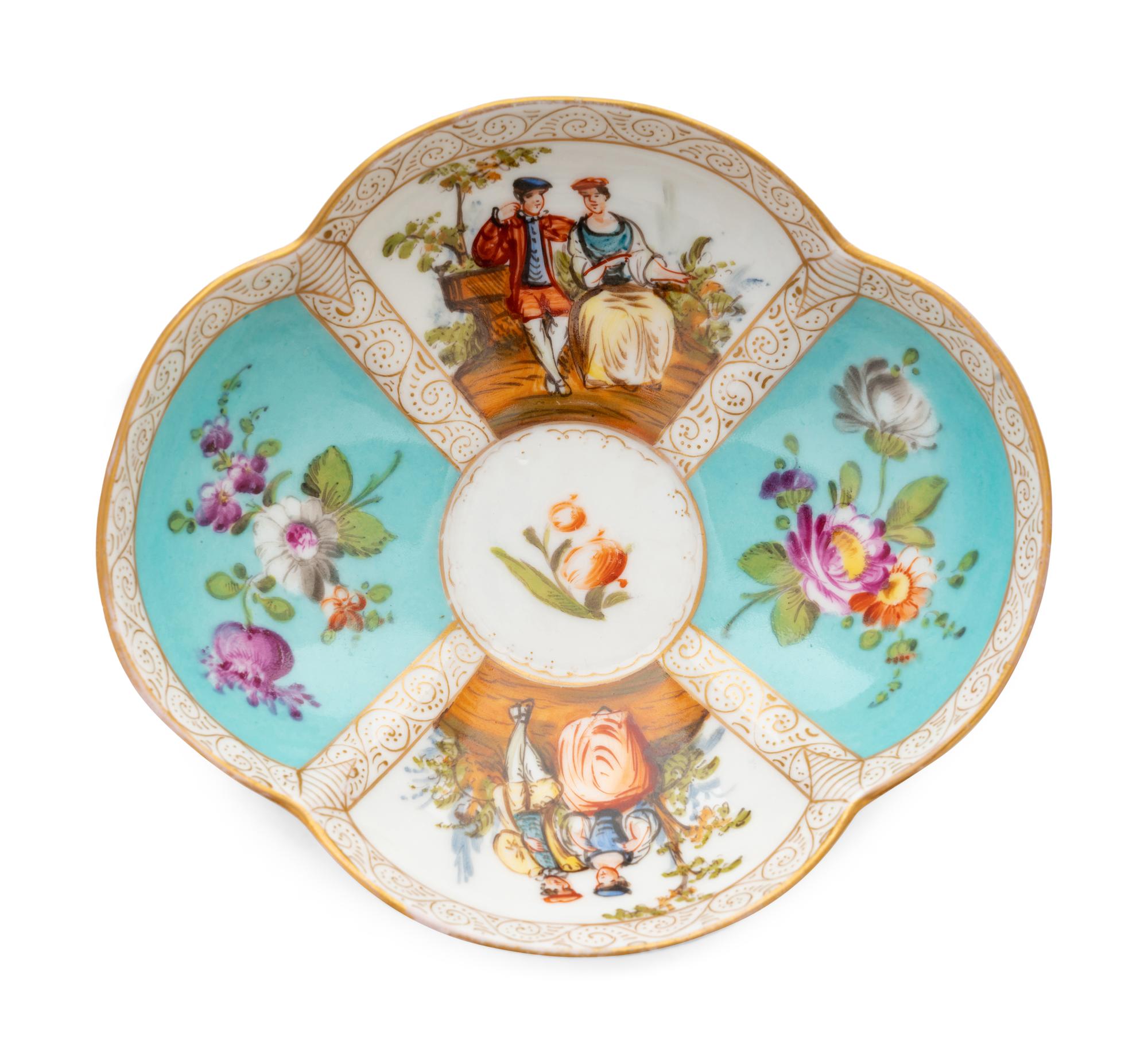 A German Porcelain Covered Cup and Saucer