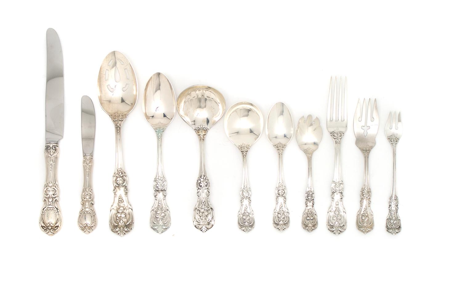 An American Sterling Silver Flatware Service, Reed and Barton, Largest 10 5/8 inches.