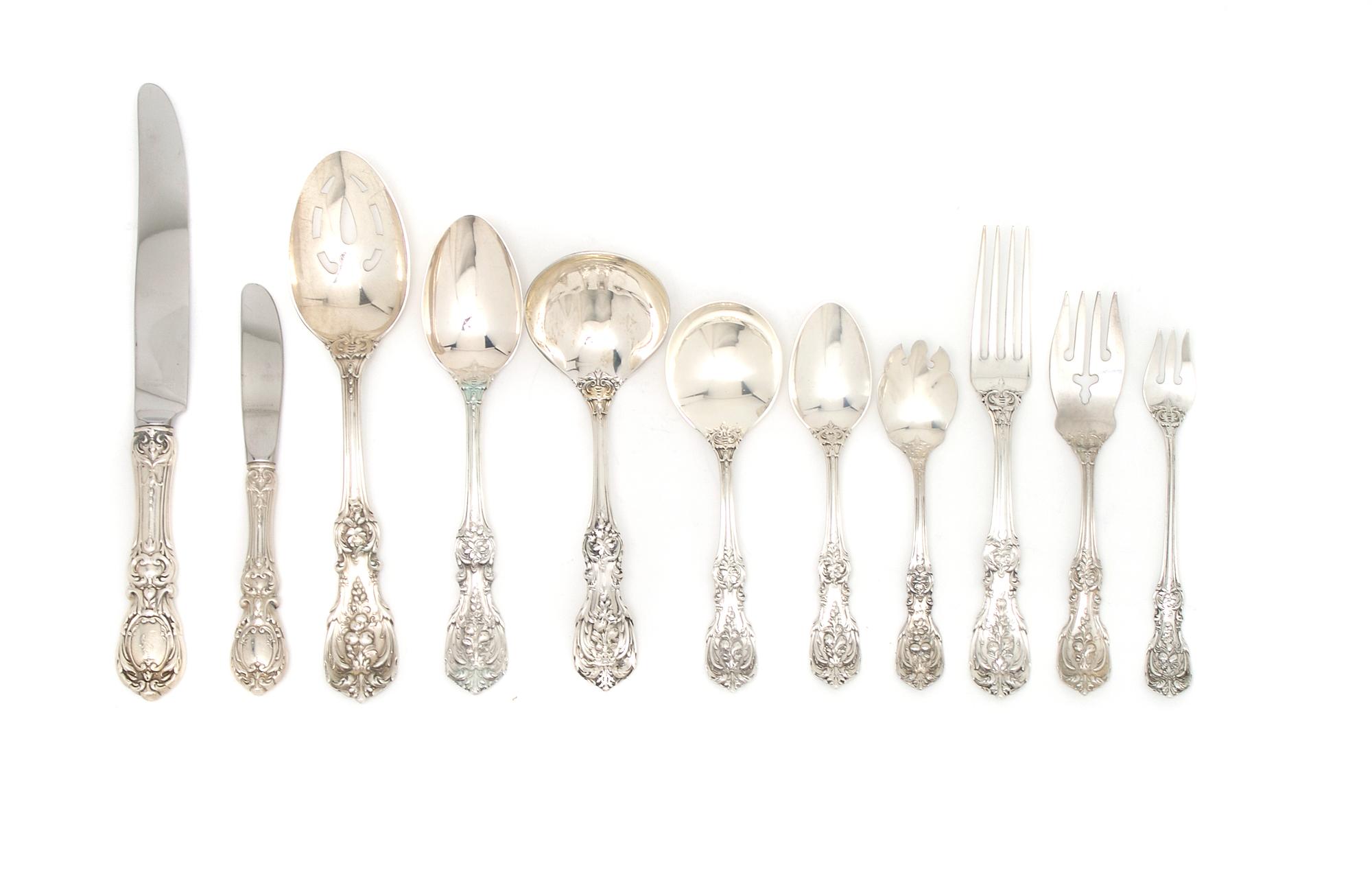 An American Sterling Silver Flatware Service, Reed and Barton, Largest 10 5/8 inches.