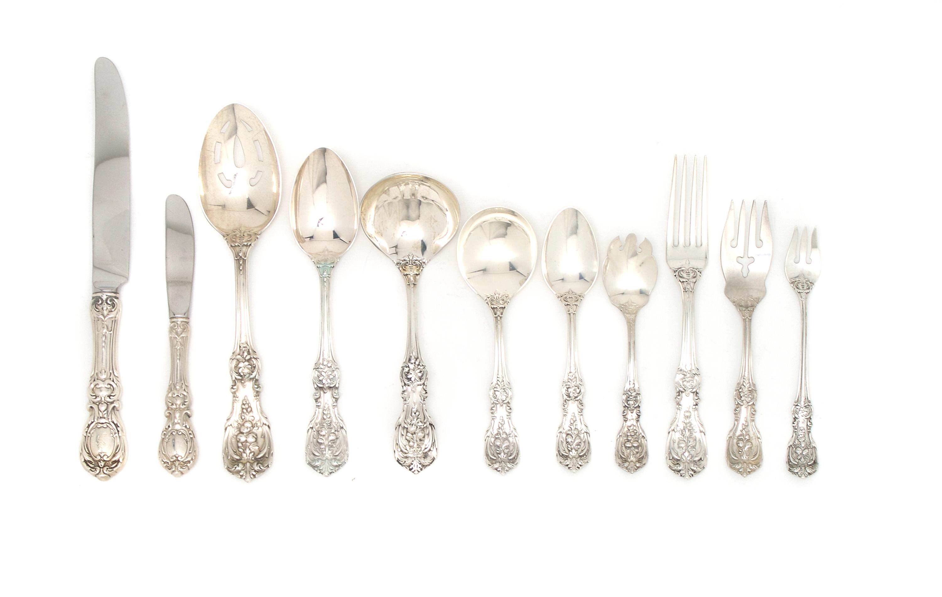 An American Sterling Silver Flatware Service, Reed and Barton, Largest 10 5/8 inches.