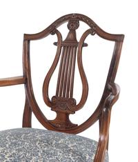 A Pair of George III Mahogany Armchairs