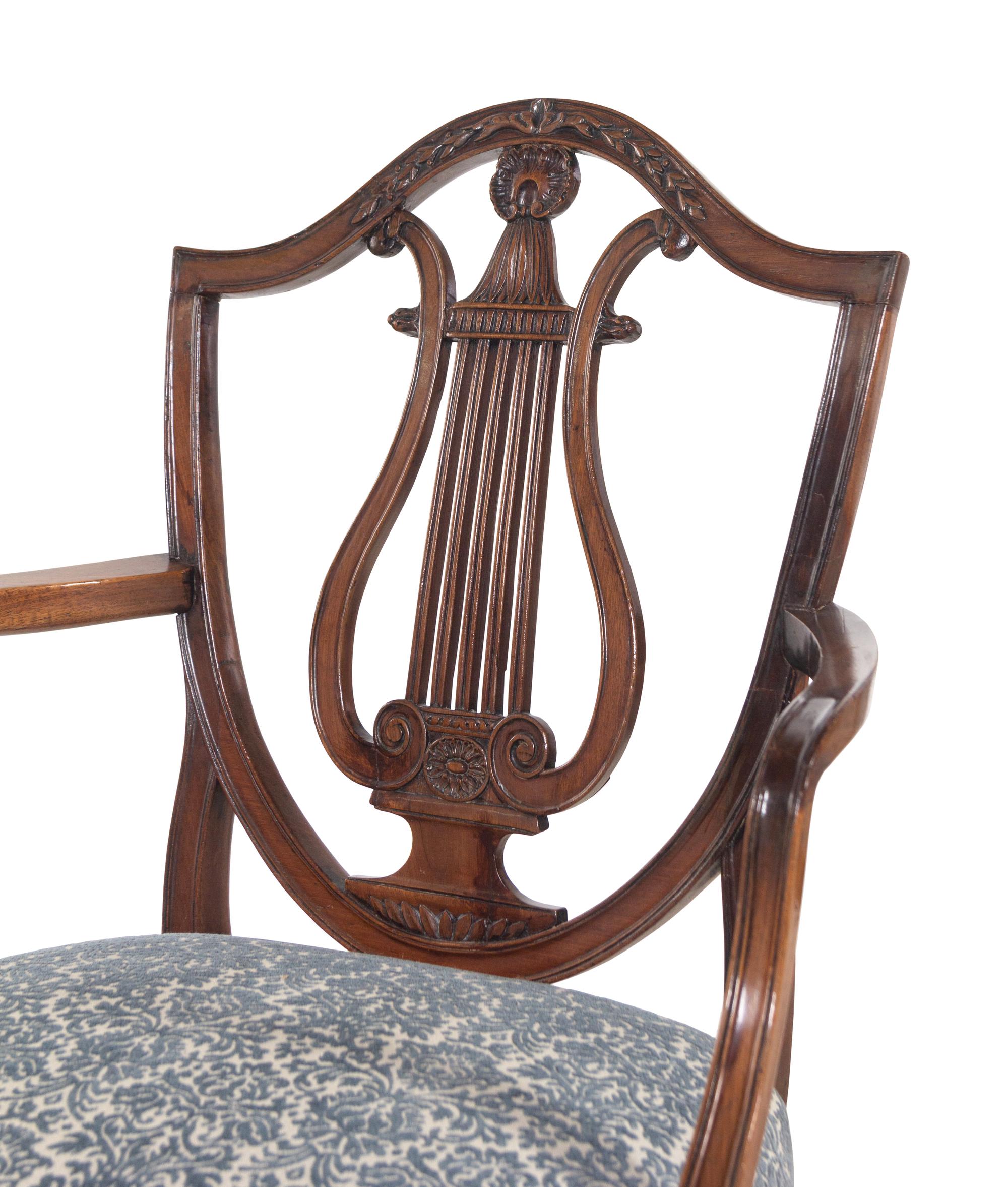 A Pair of George III Mahogany Armchairs