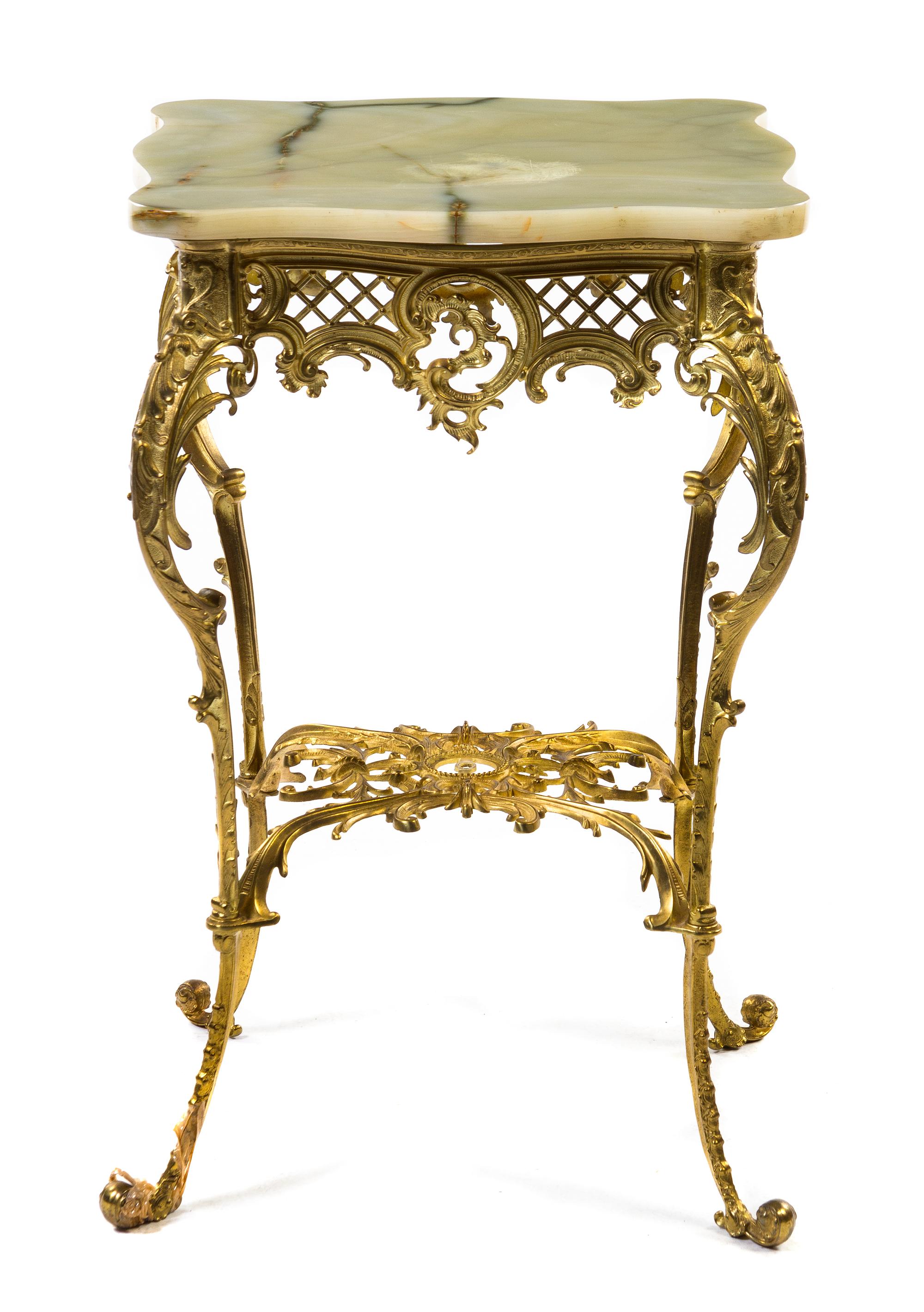 A Victorian Gilt Metal and Onyx Occasional Table, Height 30 x width 19 1/4 x depth 19 1/4 inches.