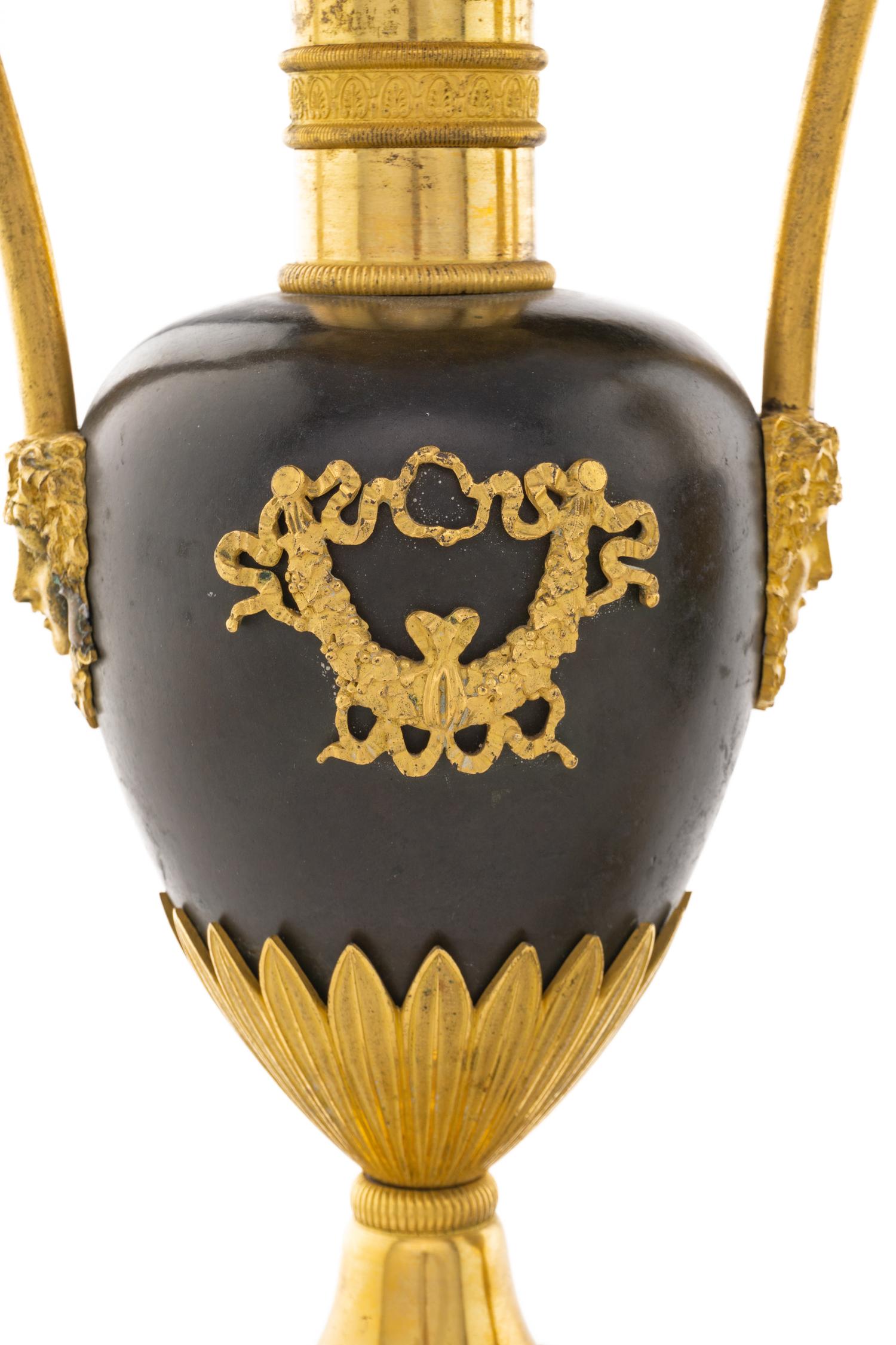 A Pair of Louis Philippe Gilt and Patinated Bronze Urns