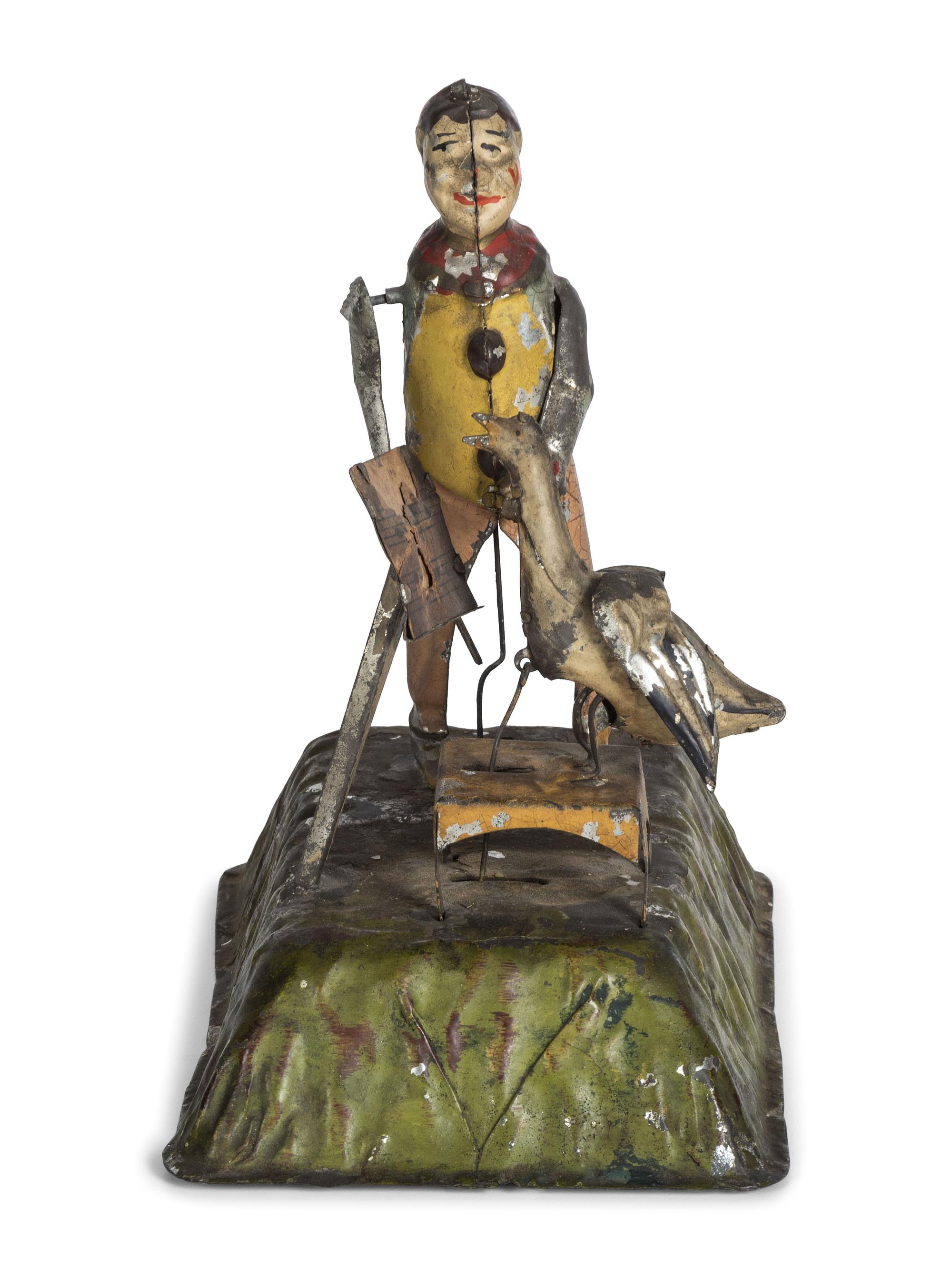 A Gunthermann Hand-Painted Tin and Paper Windup Toy