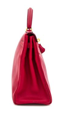 An Hermes Red 32cm Kelly Bag, 12.5" x 9" x 4.5".