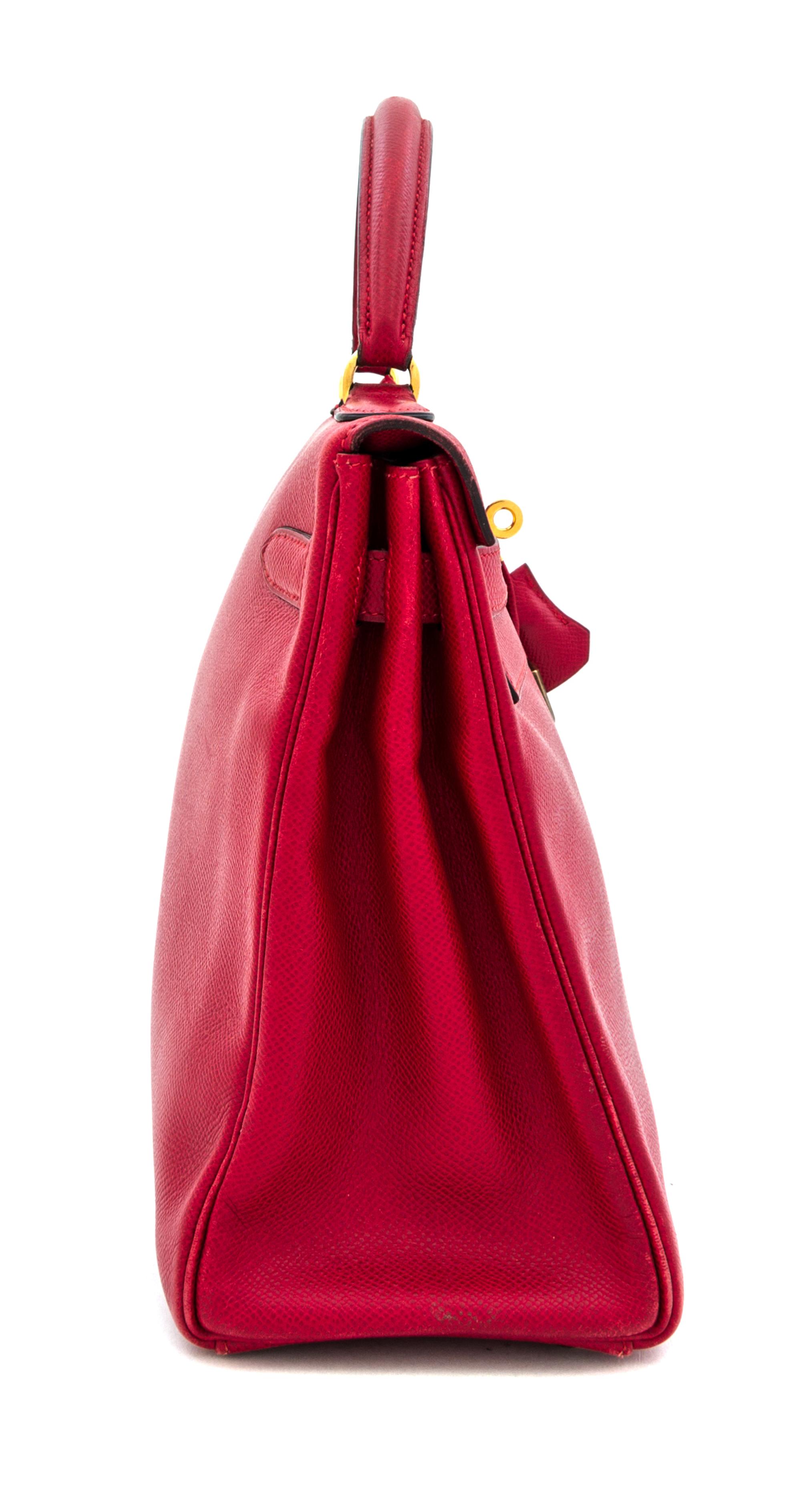 An Hermes Red 32cm Kelly Bag, 12.5" x 9" x 4.5".
