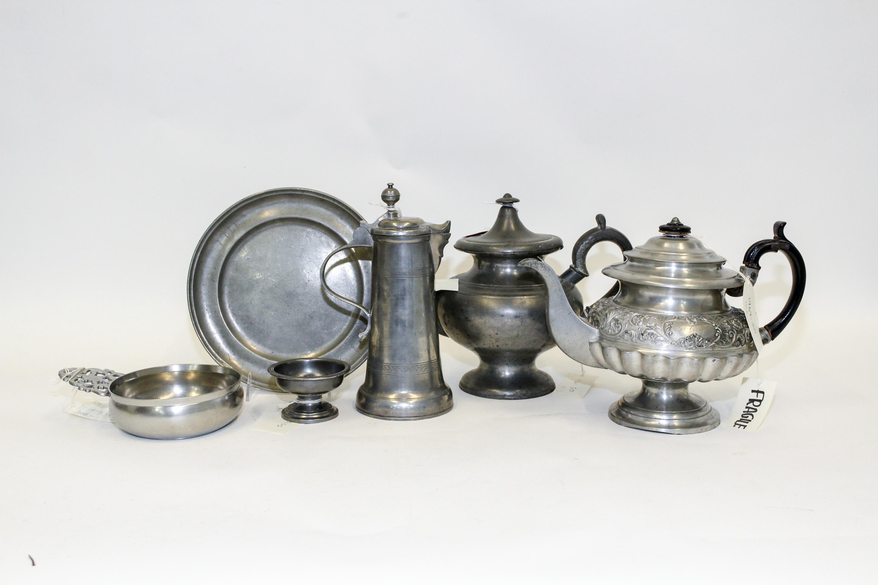 A Collection of Five Pewter Serving Articles Width of first 12 inches.