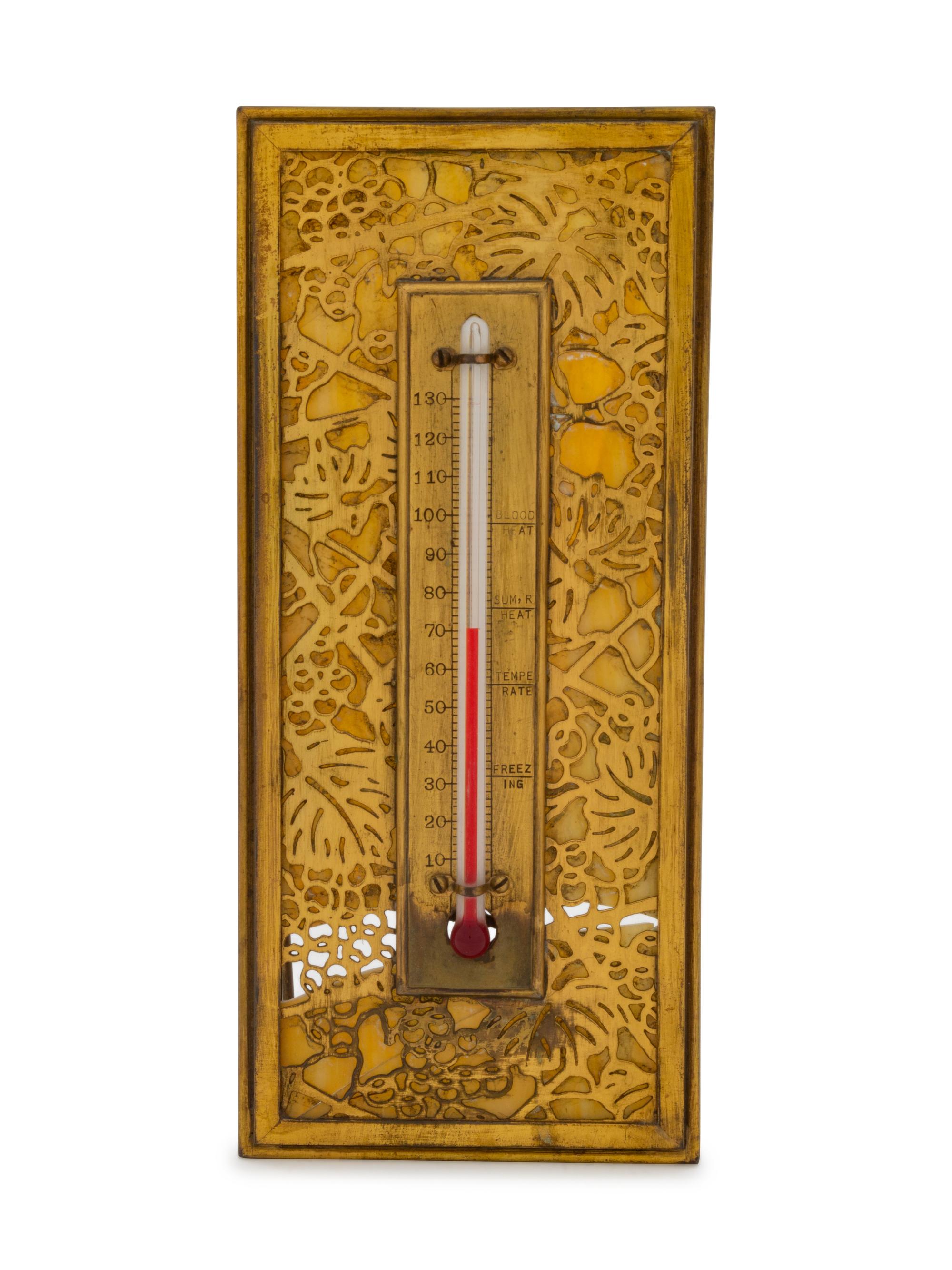 A Tiffany Studios Gilt Bronze and Glass Desk Thermometer