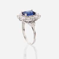A sapphire, diamond, and white gold ring