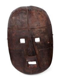 A Group of Ten Carved Ethnographic Masks