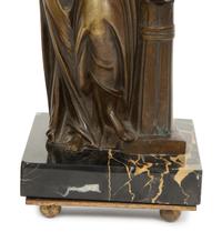 A Pair of French Bronze and Marble Figural Candlesticks
