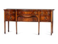 A Regency Style "Plum-Pudding" Mahogany Serpentine Sideboard